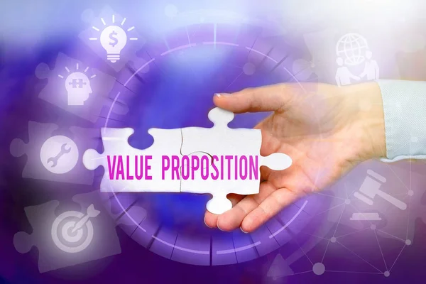 Conceptual display Value Proposition. Word Written on make a company or product attractive to customers Hand Holding Jigsaw Puzzle Piece Unlocking New Futuristic Technologies.