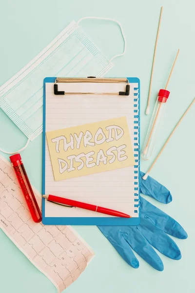 Hand writing sign Thyroid Disease. Business overview the thyroid gland fails to produce enough hormones Writing Important Medical Notes Laboratory Testing Of New Virus Medicine