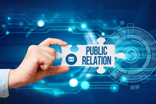 Testo che mostra ispirazione Public Relation. Internet Concept pratica di gestire deliberatamente la diffusione delle informazioni Hand Holding Puzzle Piece Unlocking New Futuristic Technologies. — Foto Stock