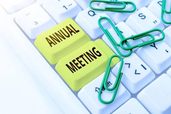 Text showing inspiration Annual Meeting. Business approach a meeting of the general membership of an organization Typing Firewall Program Codes, Typewriting Rules And Regulations Book
