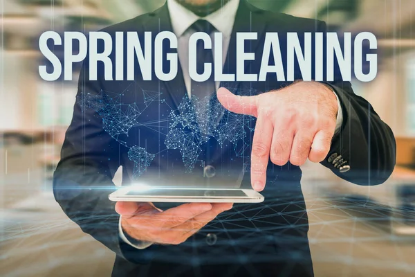 Sign displaying Spring Cleaning. Business overview thorough cleaning of a house or room during spring Man In Uniform Standing Holding Tablet Typing Futuristic Technologies. — Stock Photo, Image