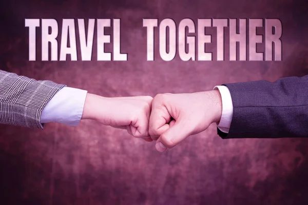 Text sign showing Travel Together. Word for opportunities to learn and grow together in an adventure Two Professional Well-Dressed Corporate Businessmen Handshake Indoors