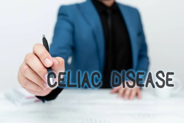 手書きサイン｜Celiac Disease.ビジネスは主に小腸に影響する自己免疫疾患を紹介する重要なアイデアを話し合うビジネスプランのデザインを提示し説明する — ストック写真