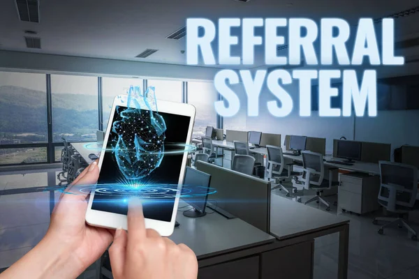 Conceptual display Referral System. Business concept sending own patient to another physician for treatment Hand Touching Screen Of Mobile Phone In Office Shows Futuristic Technology. — Stock Photo, Image
