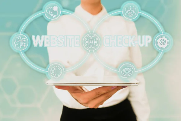 Hand writing sign Website Check Up. Word Written on an examination of a website to see if something is in order Lady Uniform Standing Tablet Hand Presenting Virtual Modern Technology — Stock Photo, Image