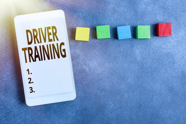 Handwriting text Driver Training. Business concept prepares a new driver to obtain a driver s is license Stack of Sample Cube Rectangular Boxes On Surface Polished With Multi-Colour