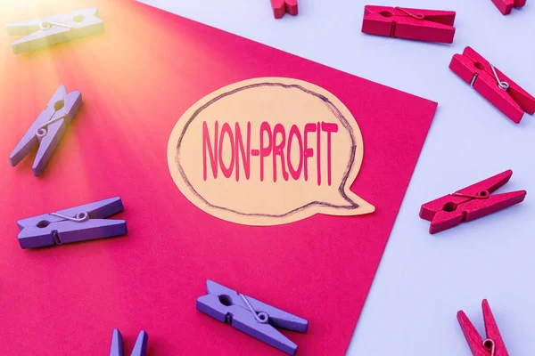 Tekenen met Non-Profit. Word Written on not making or conducted mainly to make profit organization Writing Important Notes Displaying Messages And Listing Items — Stockfoto