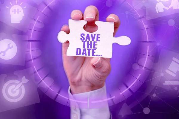 Tekstbord met Save The Date erop. Word Written on remember specific important days or time using calendar Hand Holding Jigsaw Puzzle Piece Unlocking New Futuristic Technologies — Stockfoto