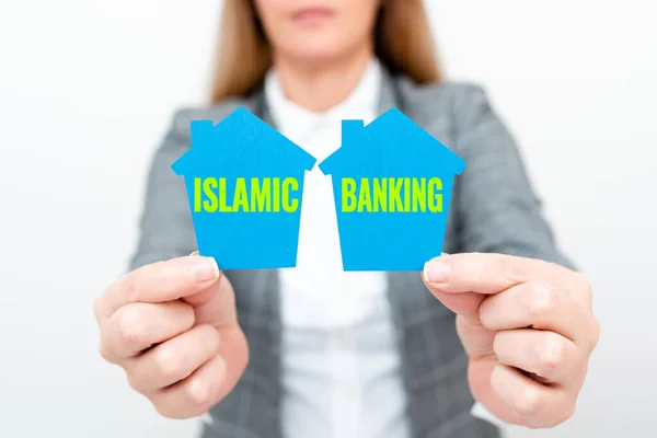 Podpis zobrazující islámské bankovnictví. Word Written on Banking system based on the principles of Islamic law A Young Lady Businesswoman Holding Presenting Home In Business Outfit — Stock fotografie