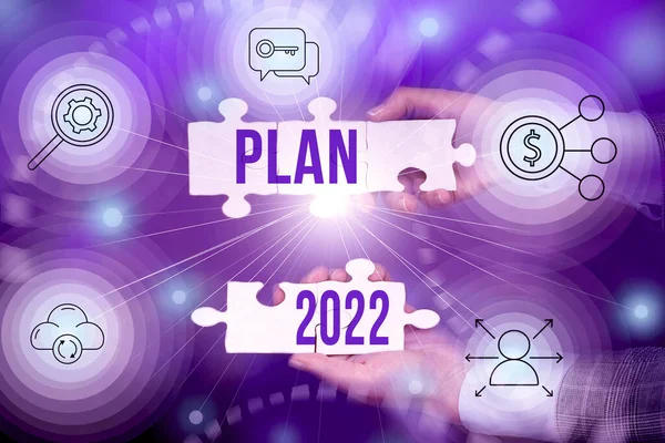 Firma autografa Plan 2022. Internet Concept proposta dettagliata per fare o realizzare qualcosa il prossimo anno Mano Holding puzzle pezzo sbloccare nuove tecnologie futuristiche. — Foto Stock