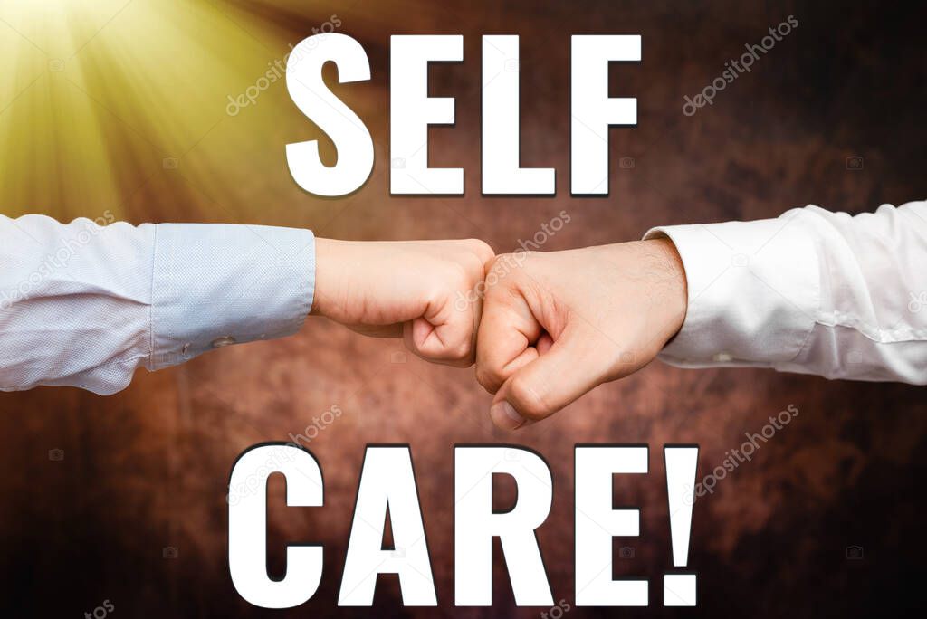 Inspiration showing sign Self Care. Word Written on practice of taking action preserve or improve ones own health Two Professional Well-Dressed Corporate Businessmen Handshake Indoors