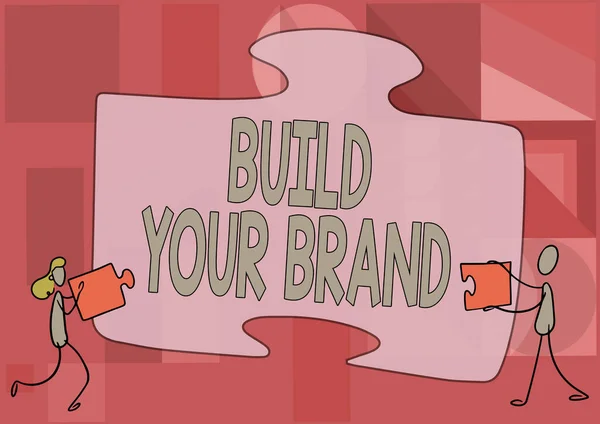 Titulek textu představující Build Your Brand. Obchodní přístup vytváří nebo zlepšuje znalosti zákazníků a názory na produkt Kolegové Kreslení Vhodné dva kusy skládačky dohromady týmová práce. — Stock fotografie
