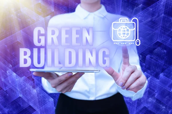 手写文字绿色建筑。商务理念一个对环境负责的可持续女士在统一手持电话虚拟按键未来技术中的结构. — 图库照片