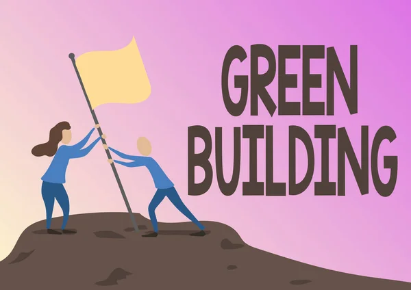 Conceptueel bijschrift Green Building. Zakelijke aanpak Een structuur die milieuvriendelijk is Duurzame Man en Vrouw Tekenend Staande Opstelling Vlag Op Piek van Berg. — Stockfoto