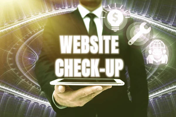 Writing displaying text Website Check Up. Business approach an examination of a website to see if something is in order Man In Office Uniform Holding Tablet Displaying New Modern Technology. — Stock Photo, Image