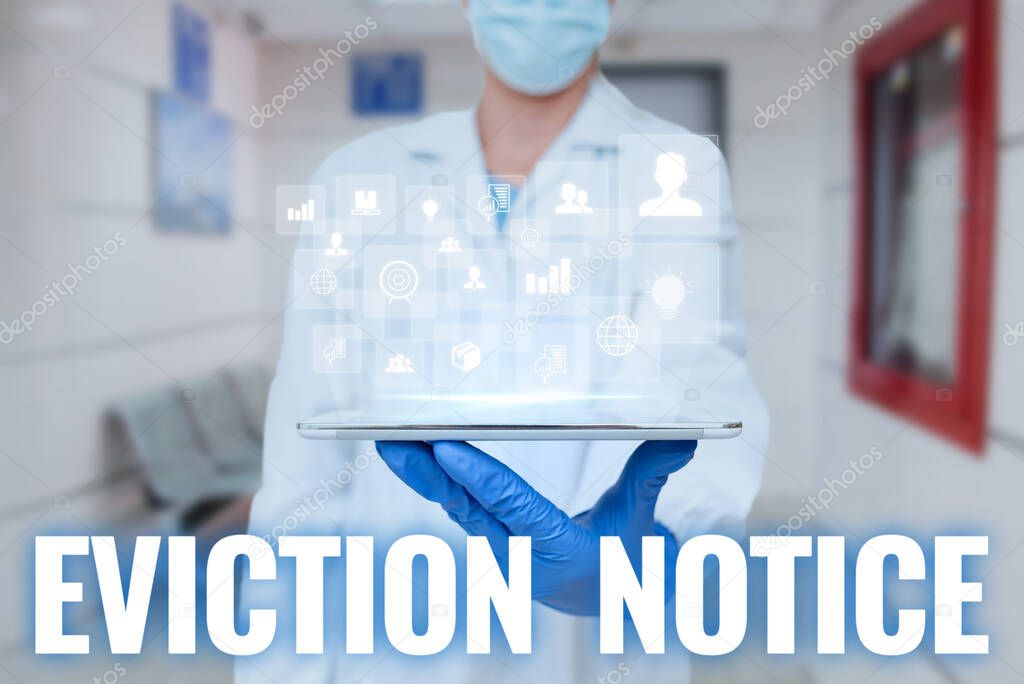 Text caption presenting Eviction Notice. Internet Concept an advance notice that someone must leave a property Man In Uniform Standing Holding Tablet Showing Medical Futuristic Tech.