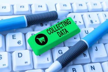 Veri toplama işaretini gösteren ilham. İş vitrinleri, ilgili değişkenler, soyut ofis daktilo işleri, daktilo önemli iş raporları hakkında bilgi toplamak ve ölçümler