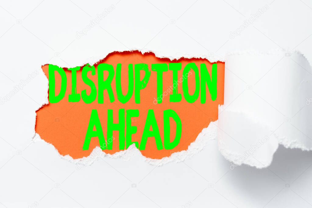 Conceptual caption Disruption Ahead. Business approach Transformation that is caused by emerging technology Tear on sheet reveals background behind the front side