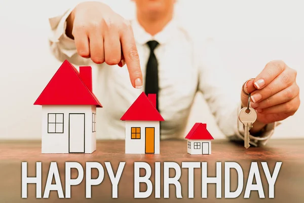 Hand writing sign Happy Birthday. Internet Concept The birth anniversary of a person is celebrated with presents Different plans for houses represented by business woman — Stock Photo, Image