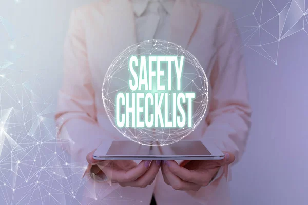 Text caption presenting Safety Checklist. Business concept list of items you need to verify, check or inspect Woman In Suit Holding Tablet With Circular Holographic Display.