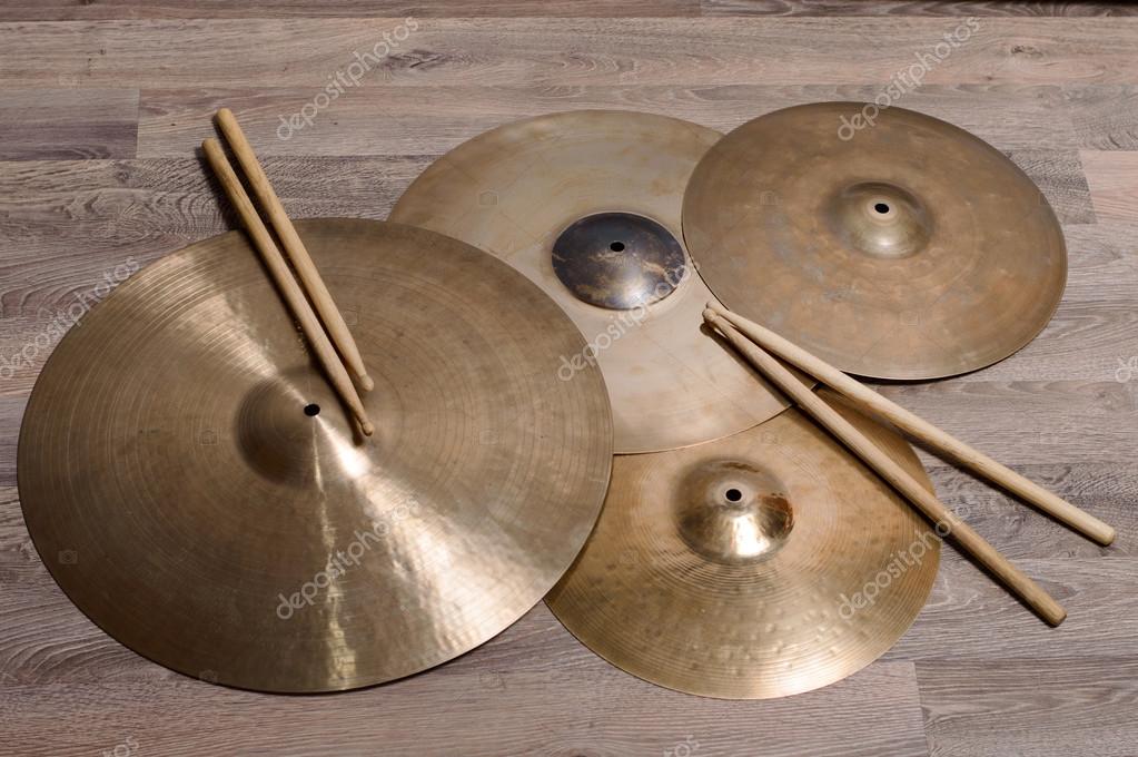 Cymbals and drumsticks Stock Photo by ©Patramansky 100168194