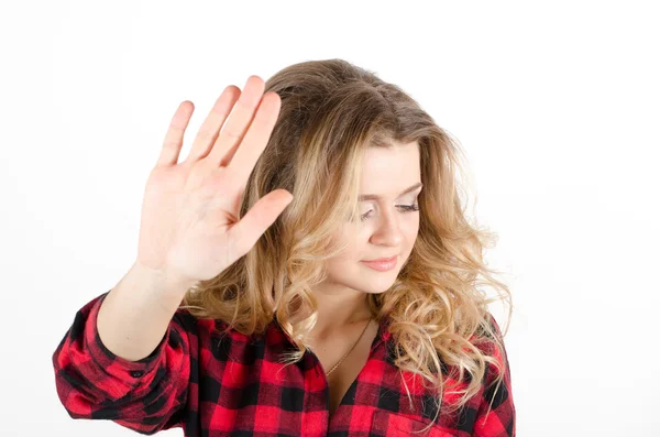 Молода жінка показує знак NO або STOP з її рукою — стокове фото