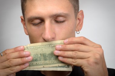 portrait of greedy man holding dollars  clipart