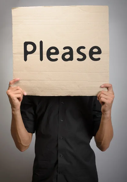 Homem bonito com placa POR FAVOR . — Fotografia de Stock