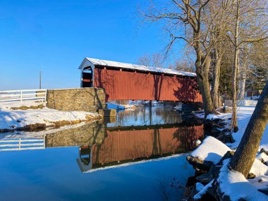 Erb's Mill Covered Bridge and reflection on a winter morning in Lancaster County