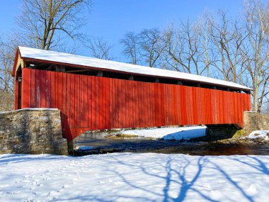 Pool Forge Covered Bridge on a snowy winter day in Lancaster Pennsylvania