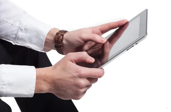 Portrait of a bearded business man using a tablet. On white background. Stock Photo