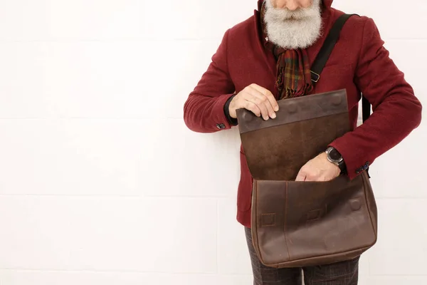 Stylish Senior Man Taking Out Something Leather Bag Posing Studio — Stock Photo, Image