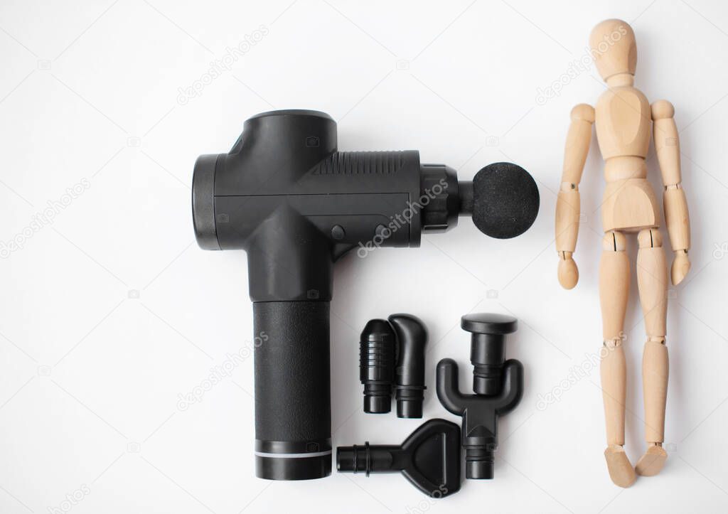 Close-up view of massage gun, handheld cordless professional percussion deep tissue body muscle fascia massager for athletes.