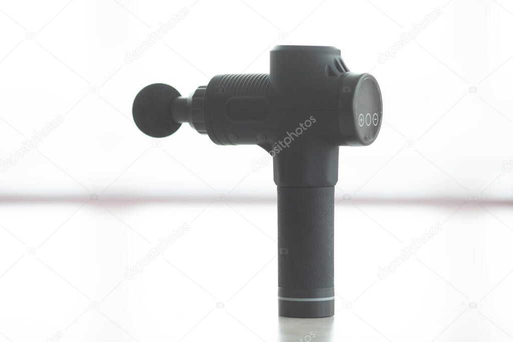 Massage gun, handheld cordless professional percussion deep tissue body muscle massager for athletes.