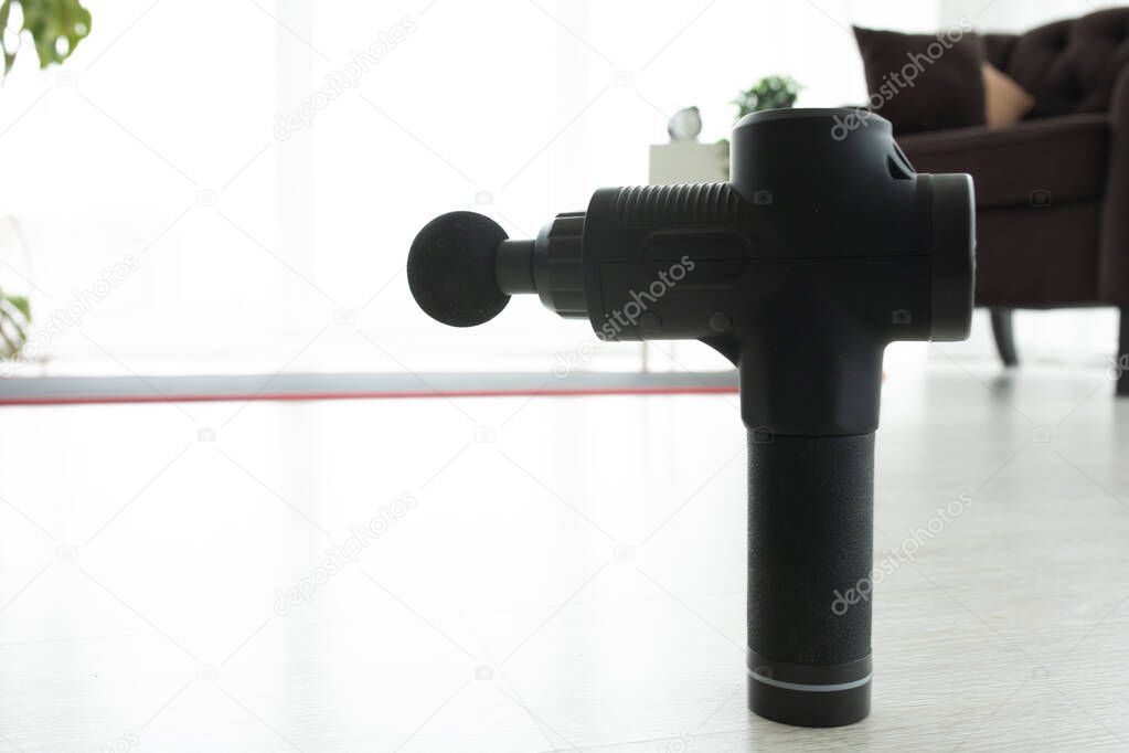 Massage gun, handheld cordless professional percussion deep tissue body muscle massager for athletes.