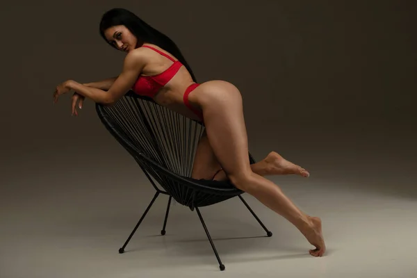 Attractive Sexy Young Woman Red Lingerie Posing Chair Studio — Stock Photo, Image