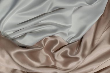 Arkaplan için yumuşak ipek kumaşın dokusu beyaz ve pembe renkler 