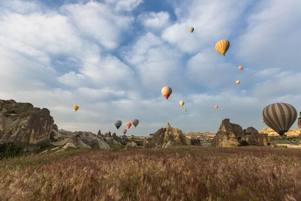 Hot air balloon trip at famous cave house Cappadocia — Stock Photo, Image