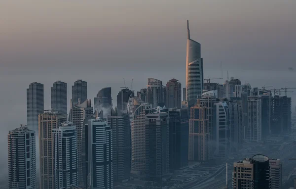 Aerial view skyscraper foggy weather Dubai Marina at morning — Stock Photo, Image