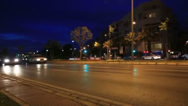 Noche ciudad tráfico tiempo lapso muñeca disparo — Vídeo de stock