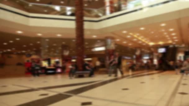 Проміжок часу людей в торговому центрі, де фокус стріляти — стокове відео