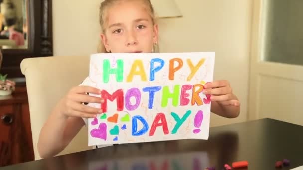 Cute girl  drawing for mother — Stock Video