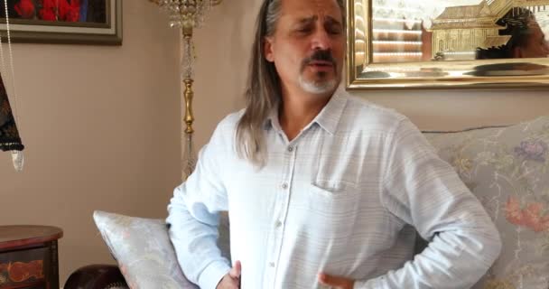 Portrait Middle Aged Man Sitting Sofa Having Strong Stomach Ache — Stock Video