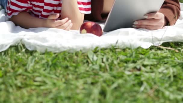 Mother and son using digital tablet — Stock Video