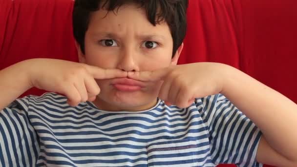 Child making funny silly faces 2 — Stock Video