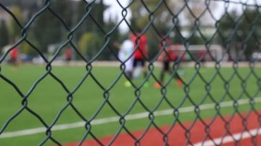 Çitin arkasında Soccer oyunu