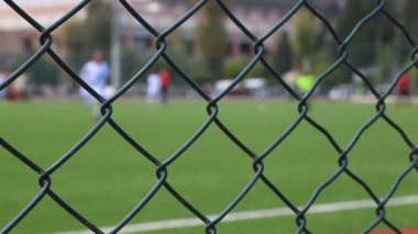 Çitin arkasında Soccer oyunu