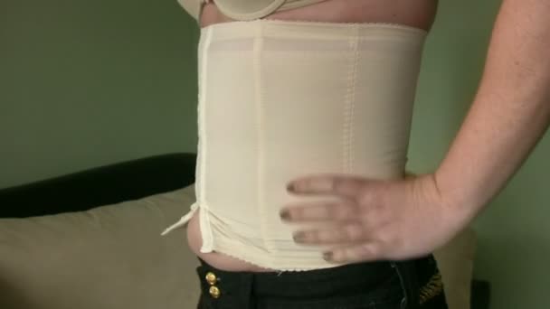 Women Applying corset — Stock Video