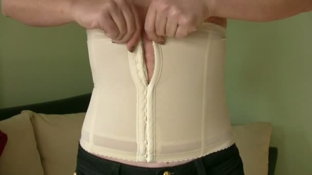 Women Applying corset — Stock Video