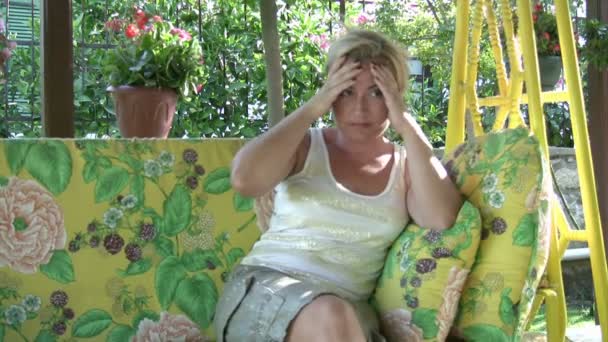 Woman with migraine — Stockvideo